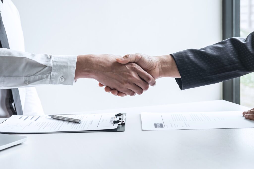 Successful Job Interview Recruiter And Applicant Shake Hands